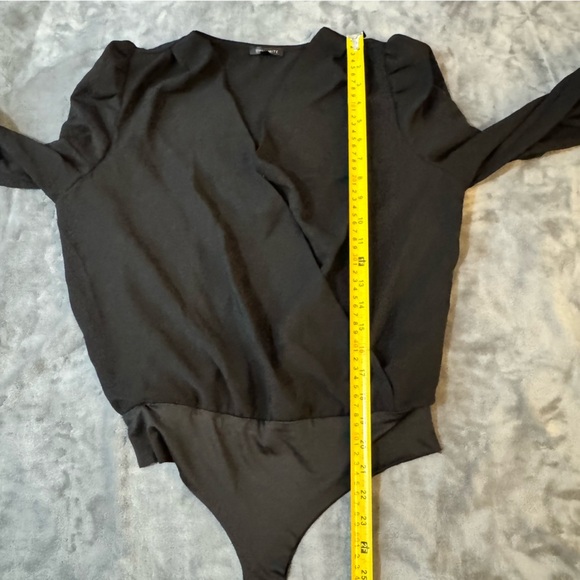 Dynamite Stylish Black Bodysuit

#1254 - Picture 4 of 8